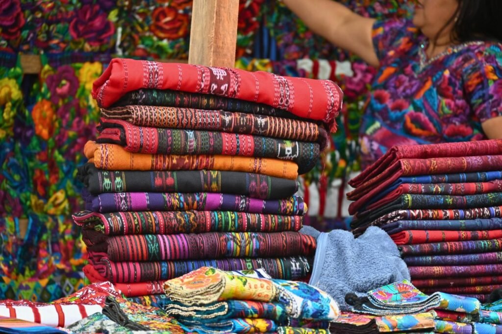 vibrant handwoven textiles displayed at sumpango market in guatemala sumpango, sacatepéquez, guatemala