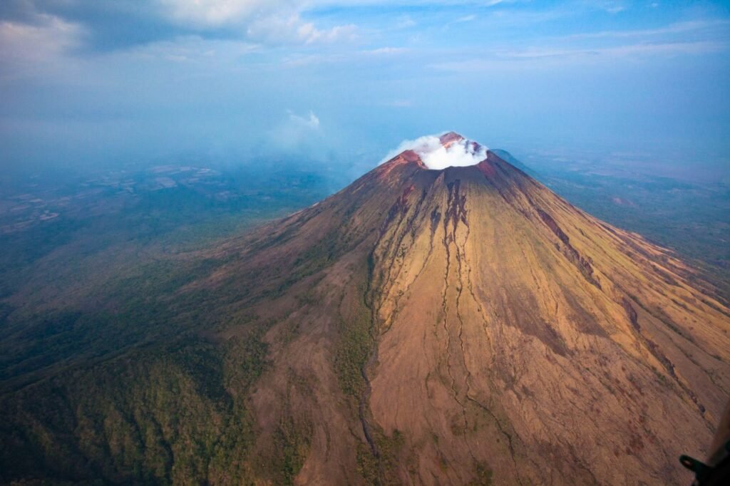a stunning aerial view of san cristobal volcano, nicaragua's highest volcano, enveloped in clouds chinandega, chinandega, nicaragua
