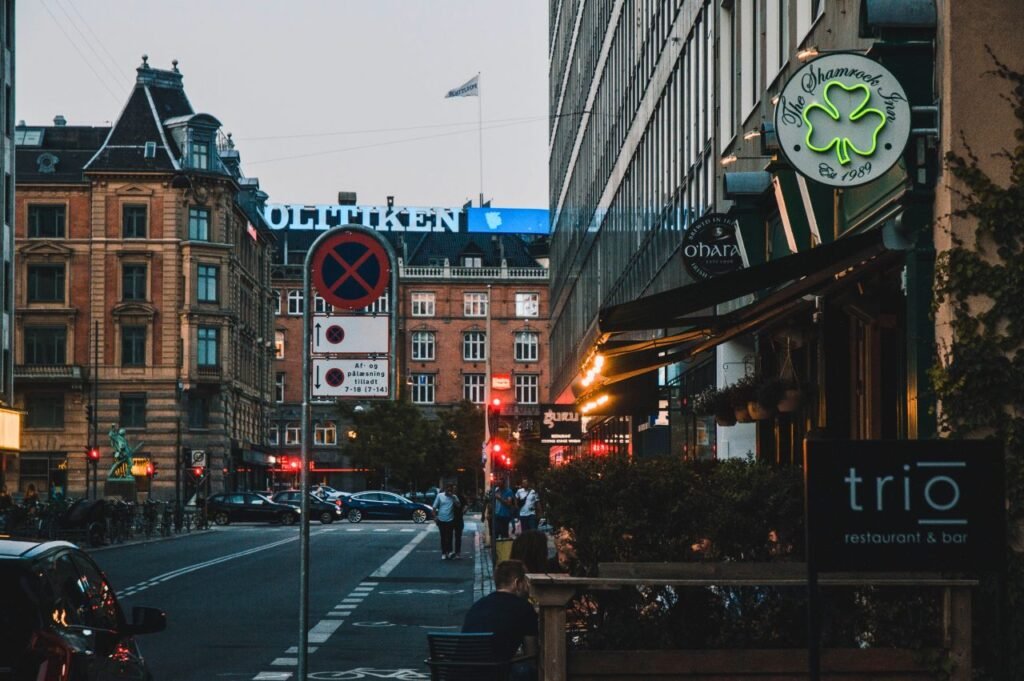 a vibrant evening street view in copenhagen featuring cafes and urban life københavn, denmark culture