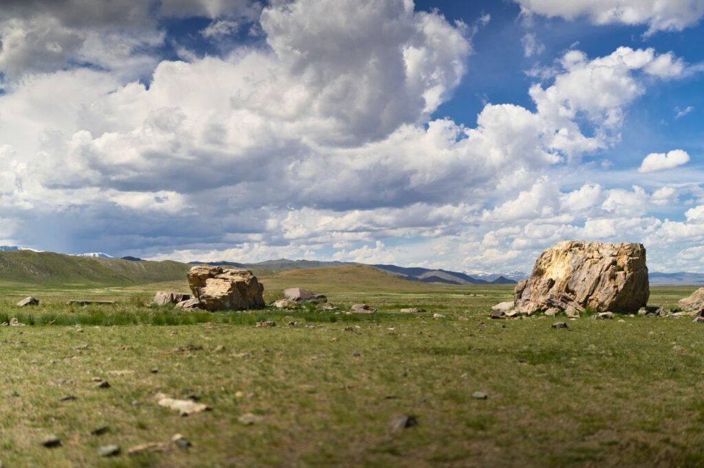explore the scenic grasslands and rocky terrain under a dramatic sky in kosh agach, altai republic, russia culture