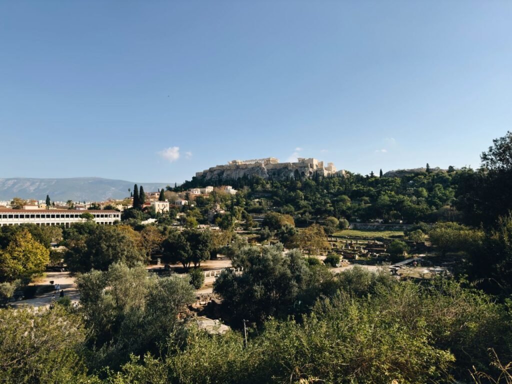 picturesque view of athens acropolis overlooking the cityscape on a clear day athens, greece