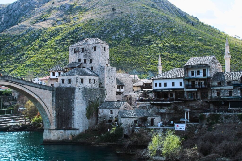 picturesque view of the historic bridge and medieval architecture in mostar, bosnia and herzegovina