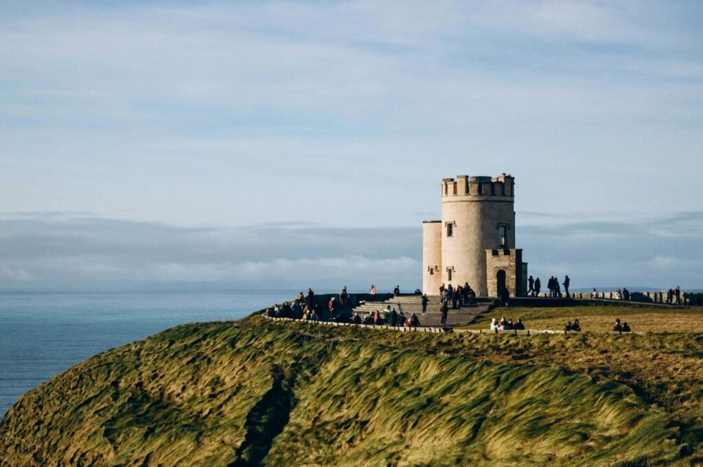 scenic view of o'brien's tower on the cliffs of moher, a popular tourist attraction in ireland.